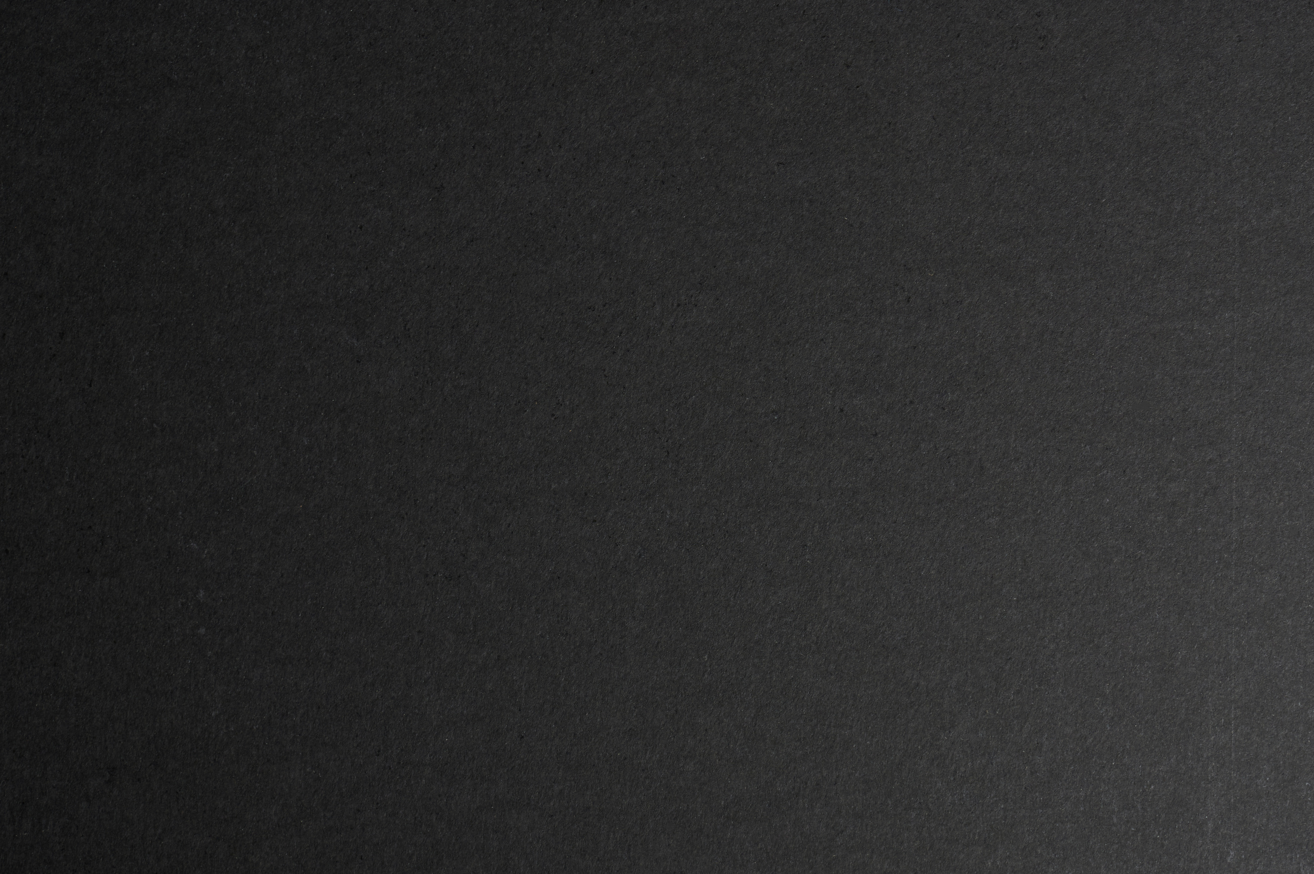 Dark grey matte paper surface